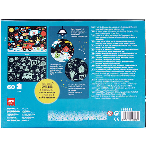 De achterkant van de puzzelverpakking met voorbeelden van de puzzel en uitleg over het glow-in-the-dark effect.