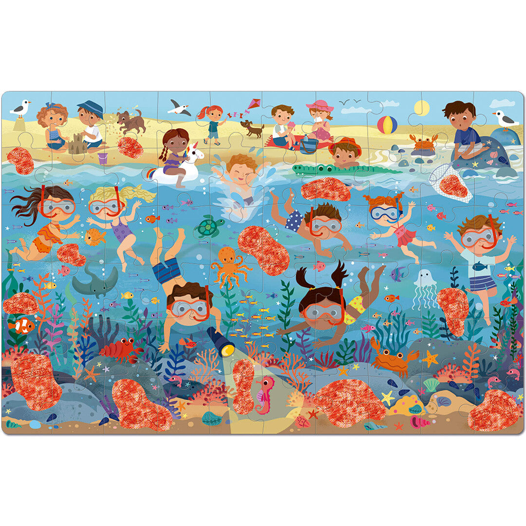 De complete Apli Kids kinderpuzzel met een kleurrijke afbeelding van kinderen die spelen op het strand en onder water.