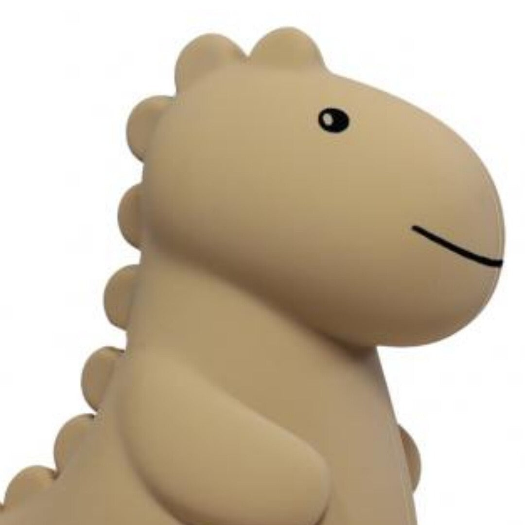 Detail van de kop en rug van de beige dino spaarpot.