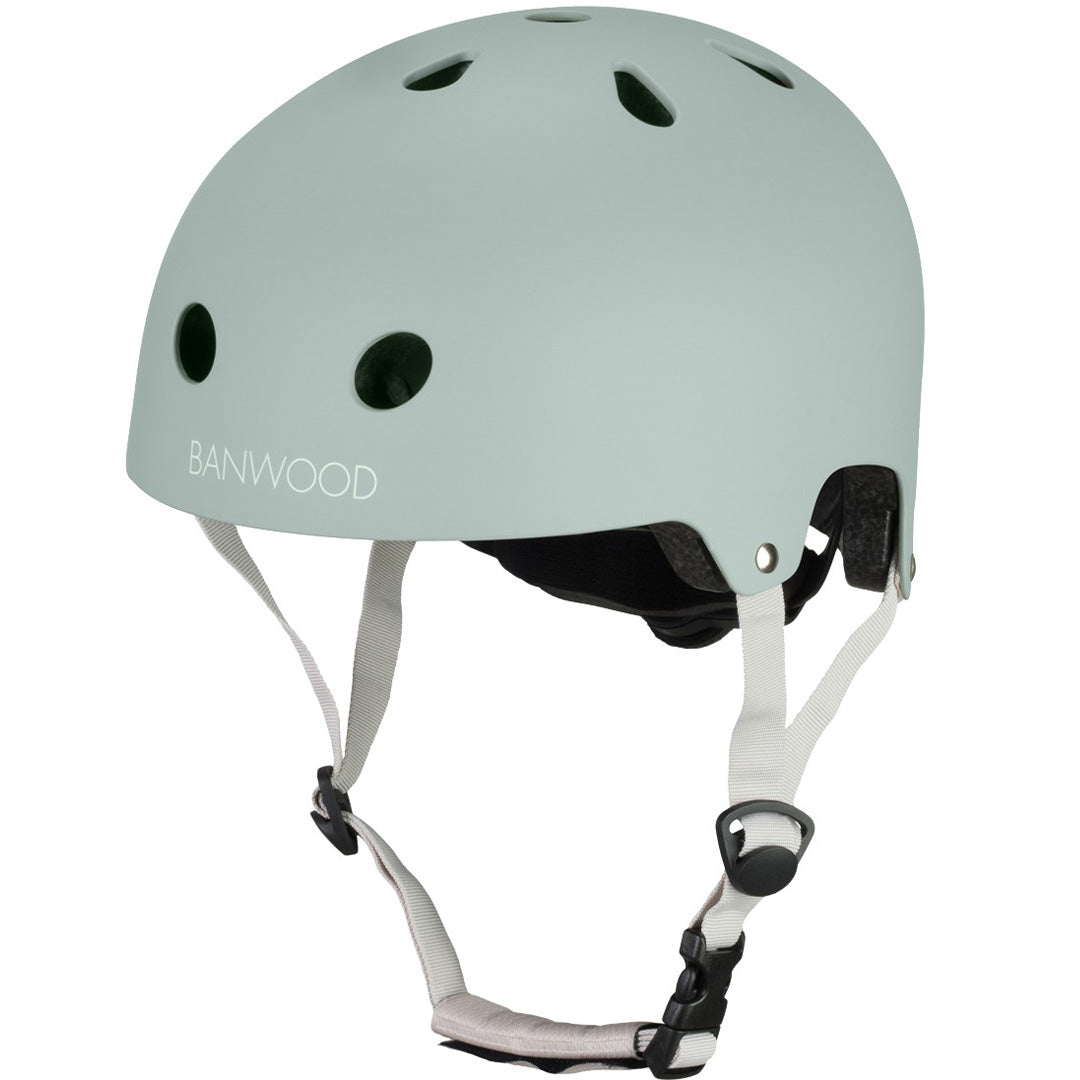 Banwood kinderhelm in lichtgroen, schuin van voren gefotografeerd.