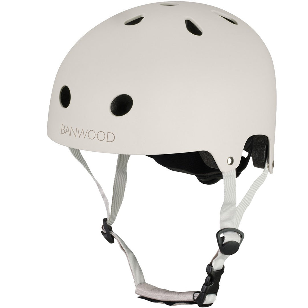 Banwood kinderhelm in ivoorkleur met ventilatiegaten en kinband.