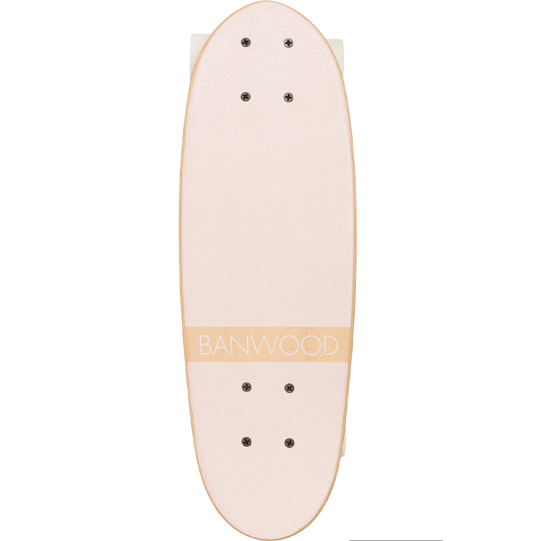 Banwood kinderskateboard met roze dek, van bovenaf gezien.