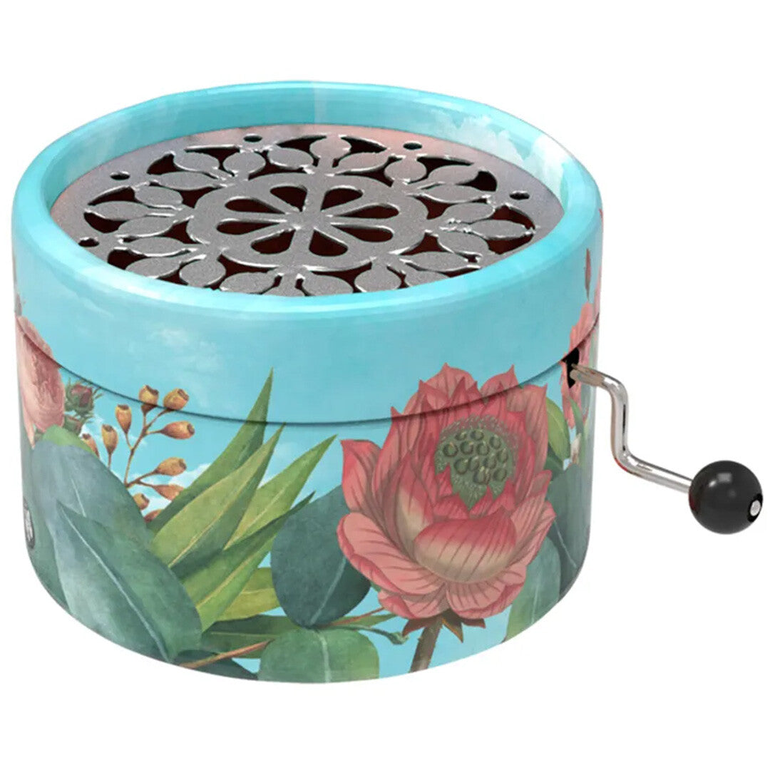 Belle Lurette muziekdoosje met een blauw bloemen- en bladerenpatroon en een metalen draaihendel.