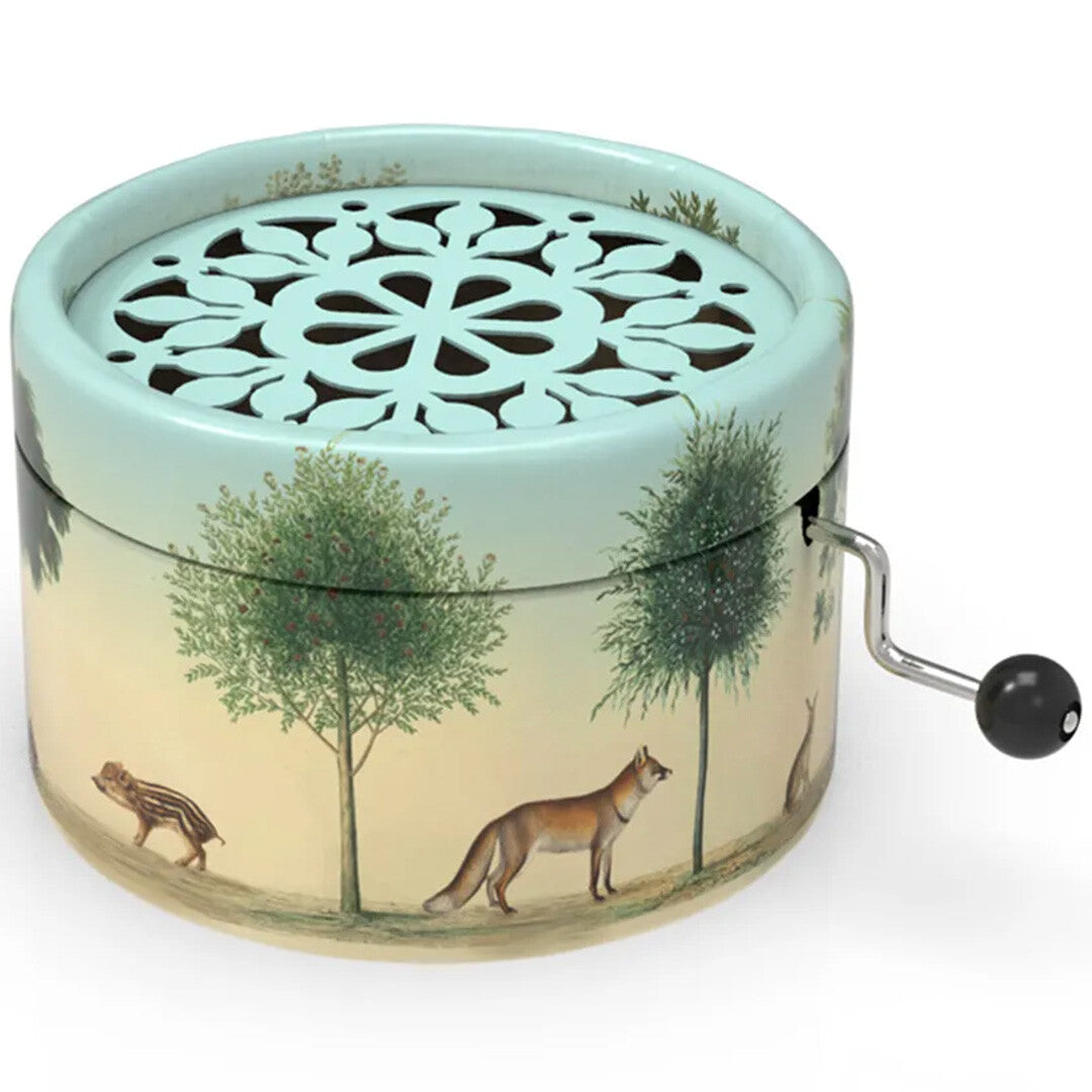 Belle Lurette muziekdoosje met bosdieren en bomen, en een blauw opengewerkt deksel.