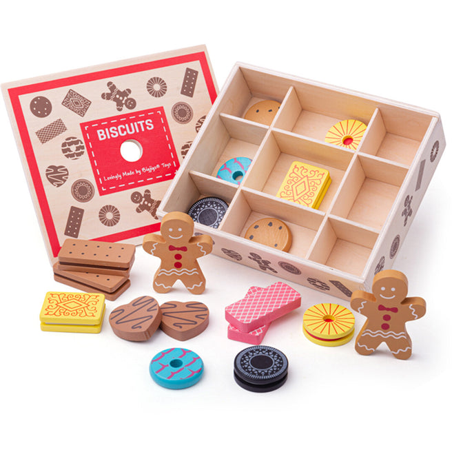 Bigjigs houten speelgoedkoekjes en een open koektrommel met vakjes, met diverse koekjes eromheen en de deksel ernaast.