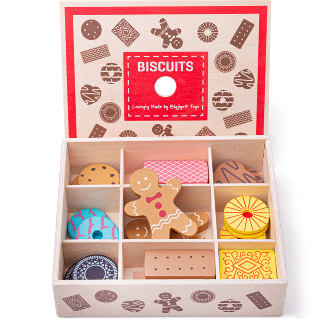 Bigjigs houten speelgoedkoekjes in een open koektrommel met vakjes, met de deksel rechtop erachter.