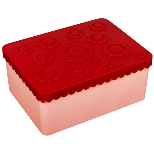 Blafle kinderlunchbox met roze onderkant en een rode deksel met bloemenpatroon erop.