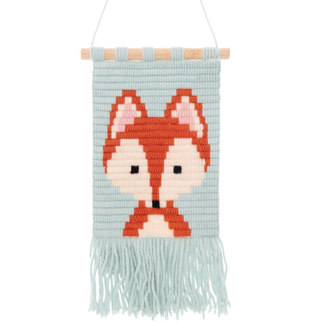Rico Design geborduurde muurhanger met een vos op een lichtblauwe achtergrond.