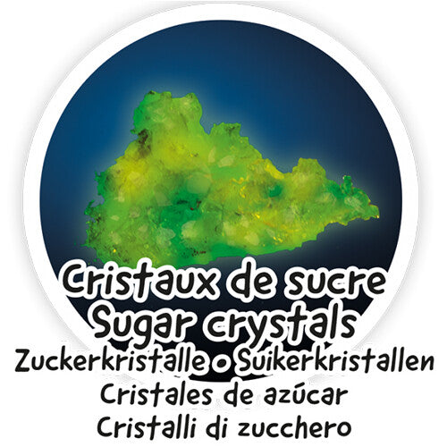 Detail van de Buki Mega Fluo & Glow set met een hoopje groene, oplichtende suikerkristallen.