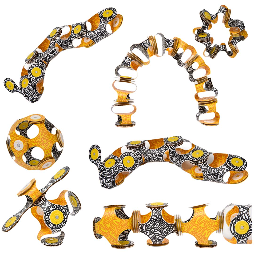 Diverse creaties van de gele en zwarte Clixo magnetische bouwstukken, waaronder een bal en een slang.