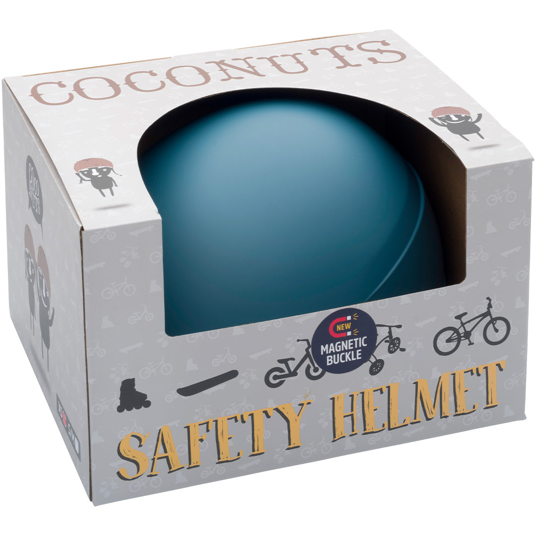 Verpakking van een Coconuts kinderhelm met een deel van de blauwe helm zichtbaar.