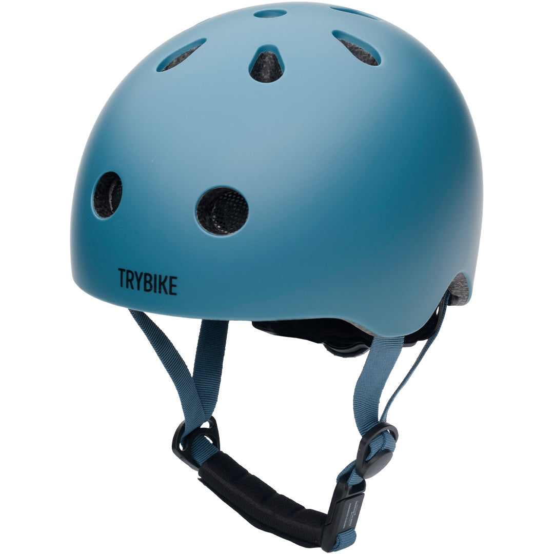 Coconuts Helmets kinderhelm in vintage blauw, schuin van voren gefotografeerd.