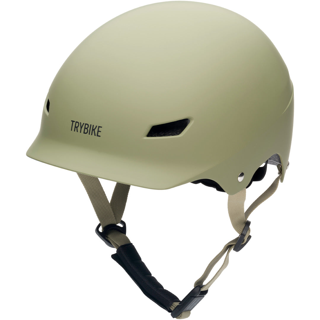 Coconuts Helmets kinderhelm in vintage groen met Trybike op de voorkant.