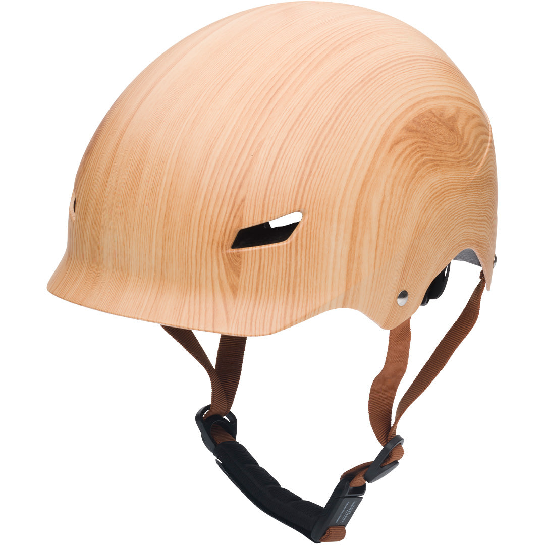Coconuts Helmets kinderfietshelm met een lichtbruin houtnerfpatroon.