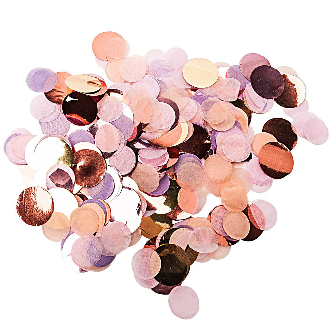 Detailfoto van een hoopje ronde confetti in pastelkleuren.