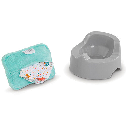 Corolle poppenpotje en een turquoise doekjesdispenser met een patroon.