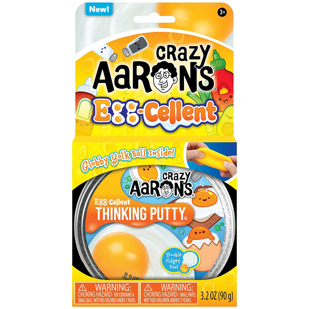 De verpakking van Crazy Aaron's Egg-Cellent Thinking Putty met een afbeelding van een gebakken ei.
