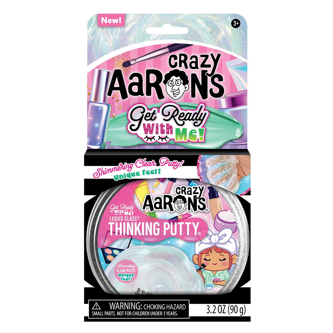 De complete retailverpakking van Crazy Aaron's "Get Ready With Me" Thinking Putty, met de ronde tin in een blisterverpakking.
