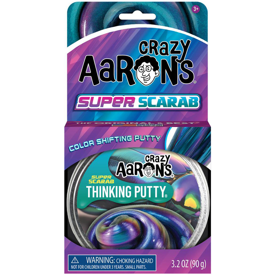 De volledige Crazy Aaron's Super Scarab Thinking Putty retailverpakking met hangkaart.