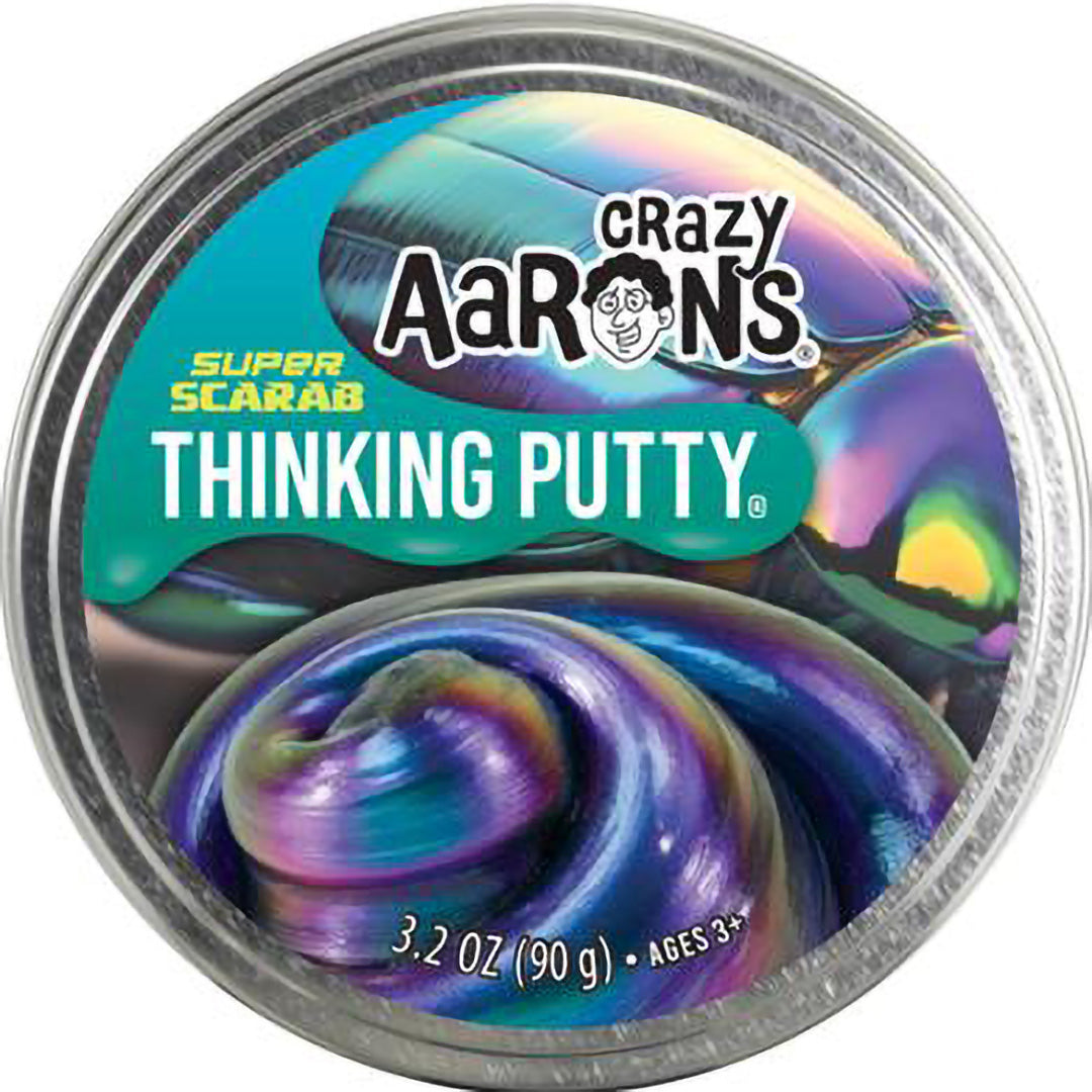 De bovenkant van de Crazy Aaron's Super Scarab Thinking Putty verpakking met een iriserende keverafbeelding.