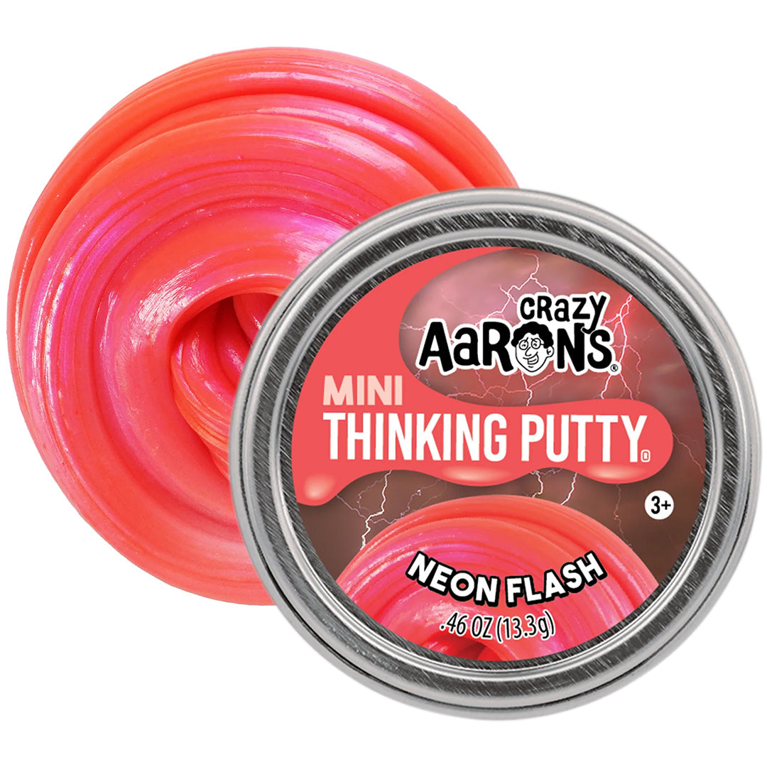 Crazy Aaron's Mini Thinking Putty Neon Flash sensorisch speelgoed, deels uit de verpakking, toont de felroze glimmende putty.
