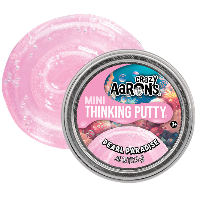 Crazy Aaron's Mini Thinking Putty Pearl Paradise blikje met de roze, glinsterende putty ernaast.