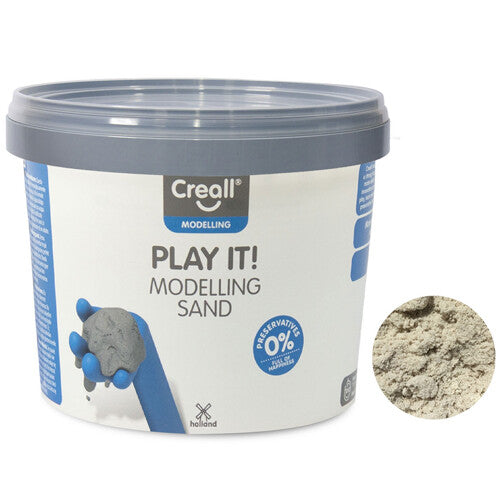 Creall modelleerzand in een grijze pot met label en een detail van de zandtextuur.