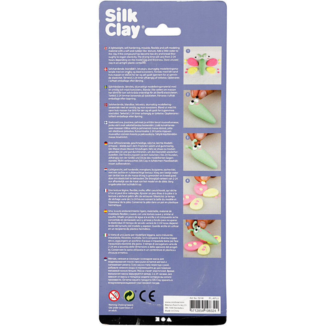 De achterkant van de verpakking van Creativ Company Silk Clay boetseerklei met instructies en voorbeelden.