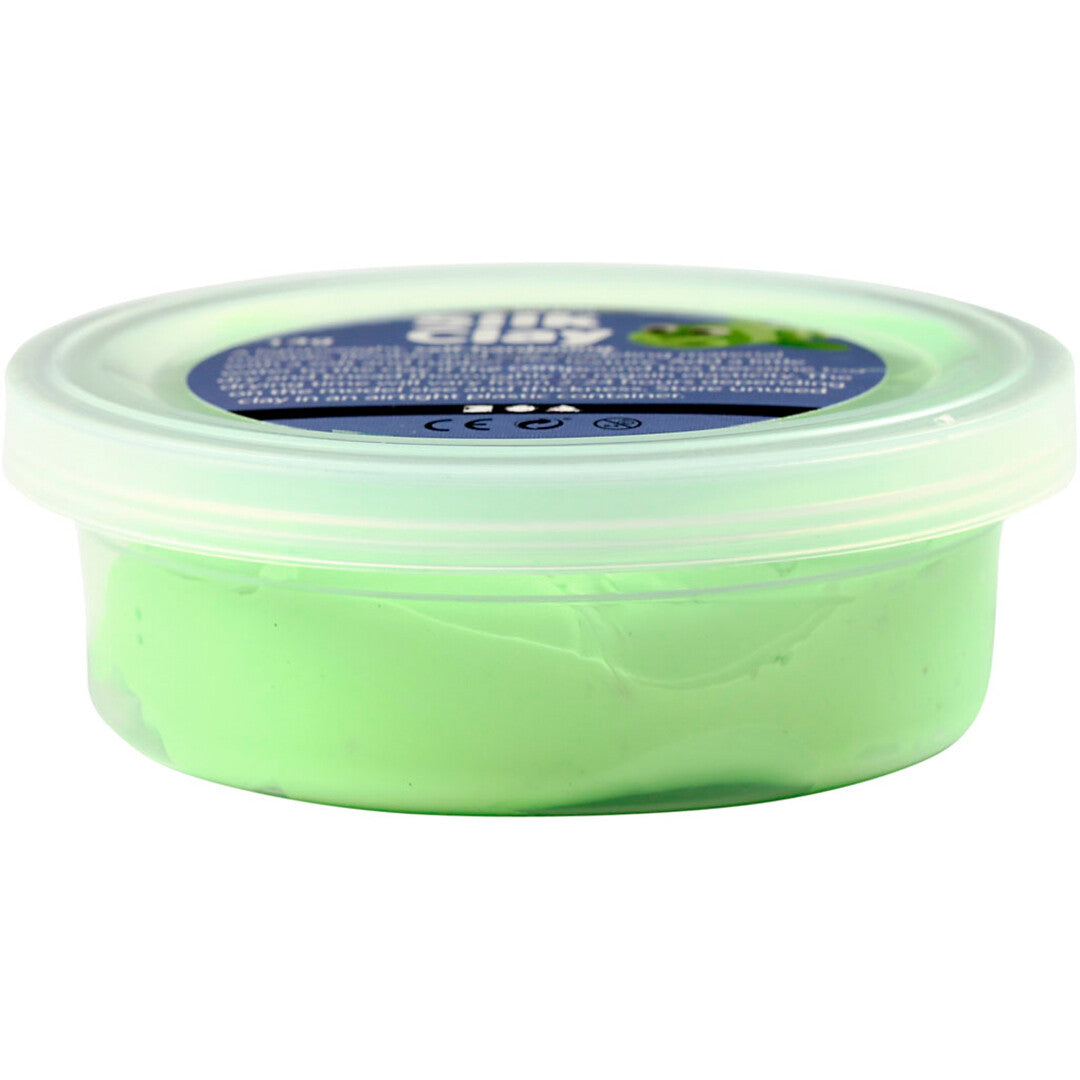 Een potje neongroene Creativ Company Silk Clay zelfhardende klei.
