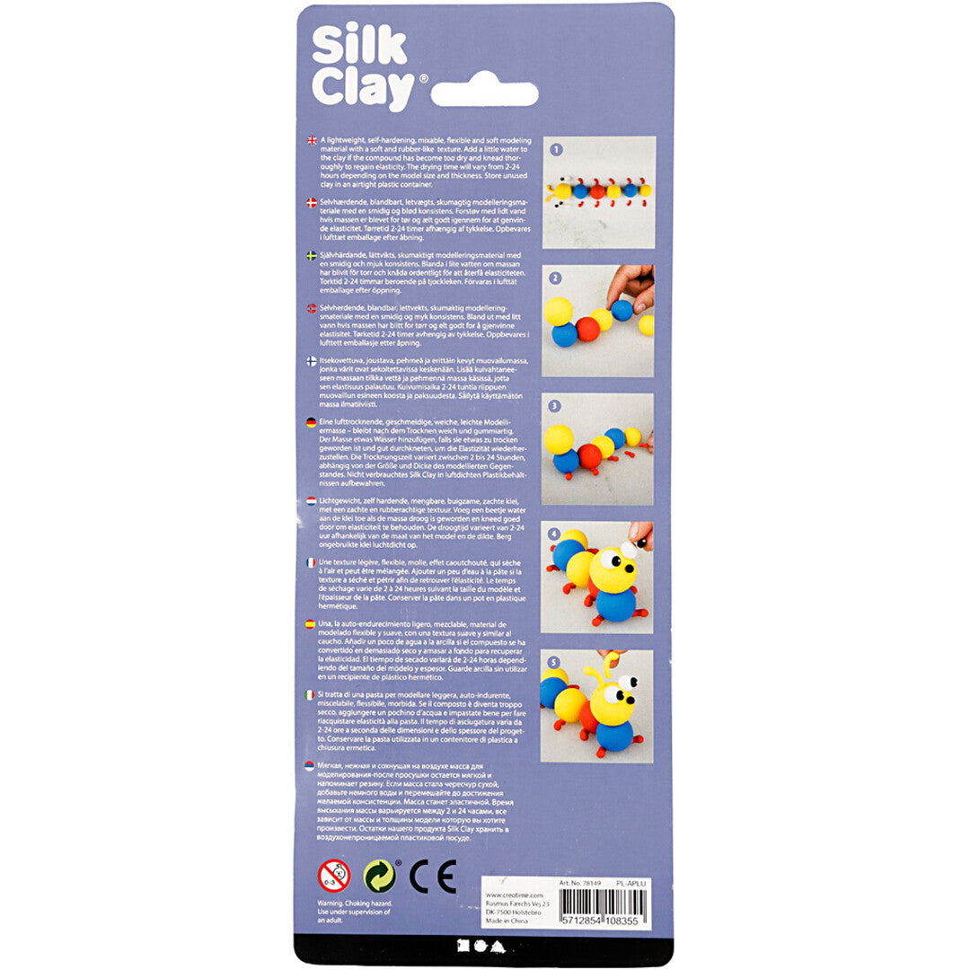 De achterkant van de verpakking van creativ company Silk Clay boetseerklei met instructies en voorbeelden van creaties.