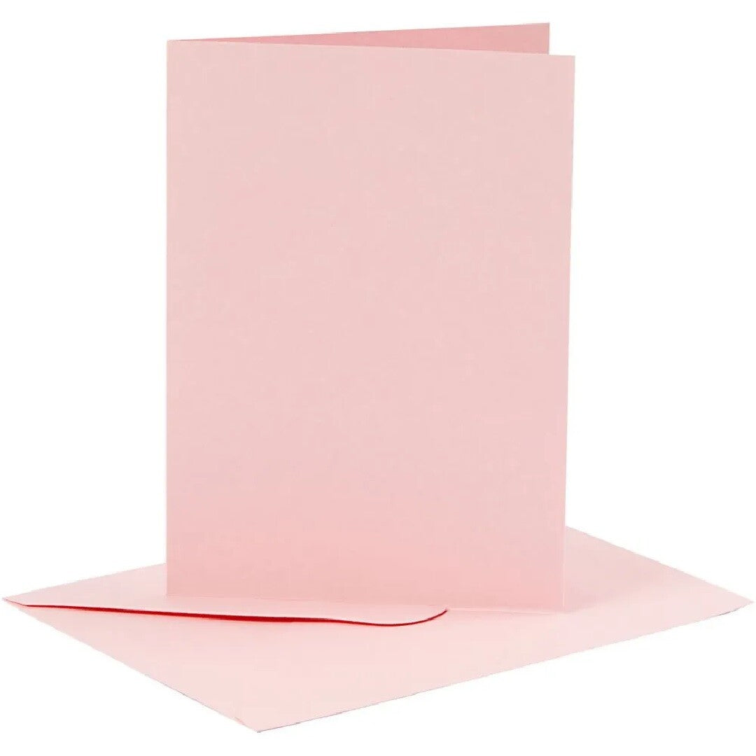 Creativ company roze gevouwen kaart met bijpassende envelop.