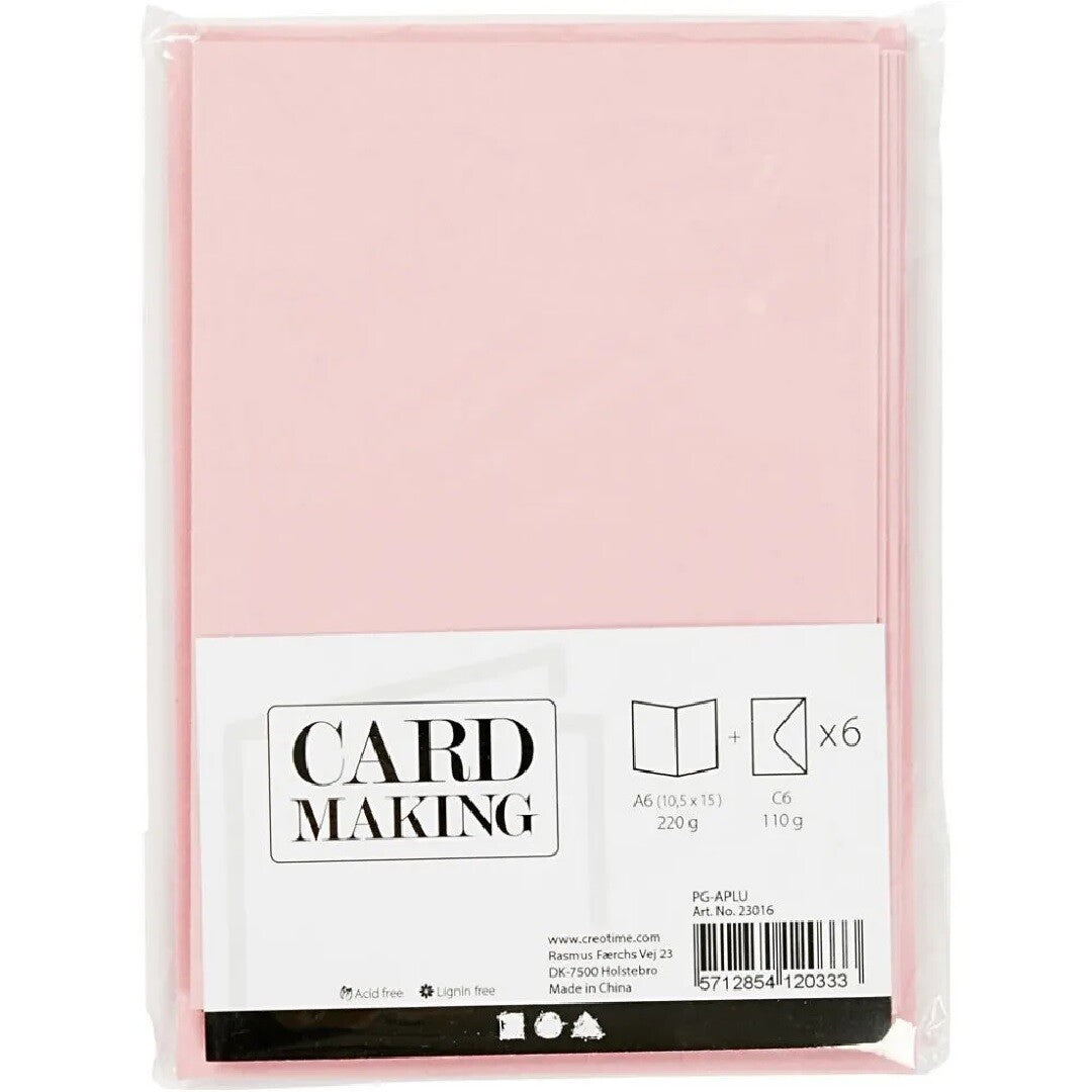 Verpakking van creativ company roze kaarten en enveloppen.