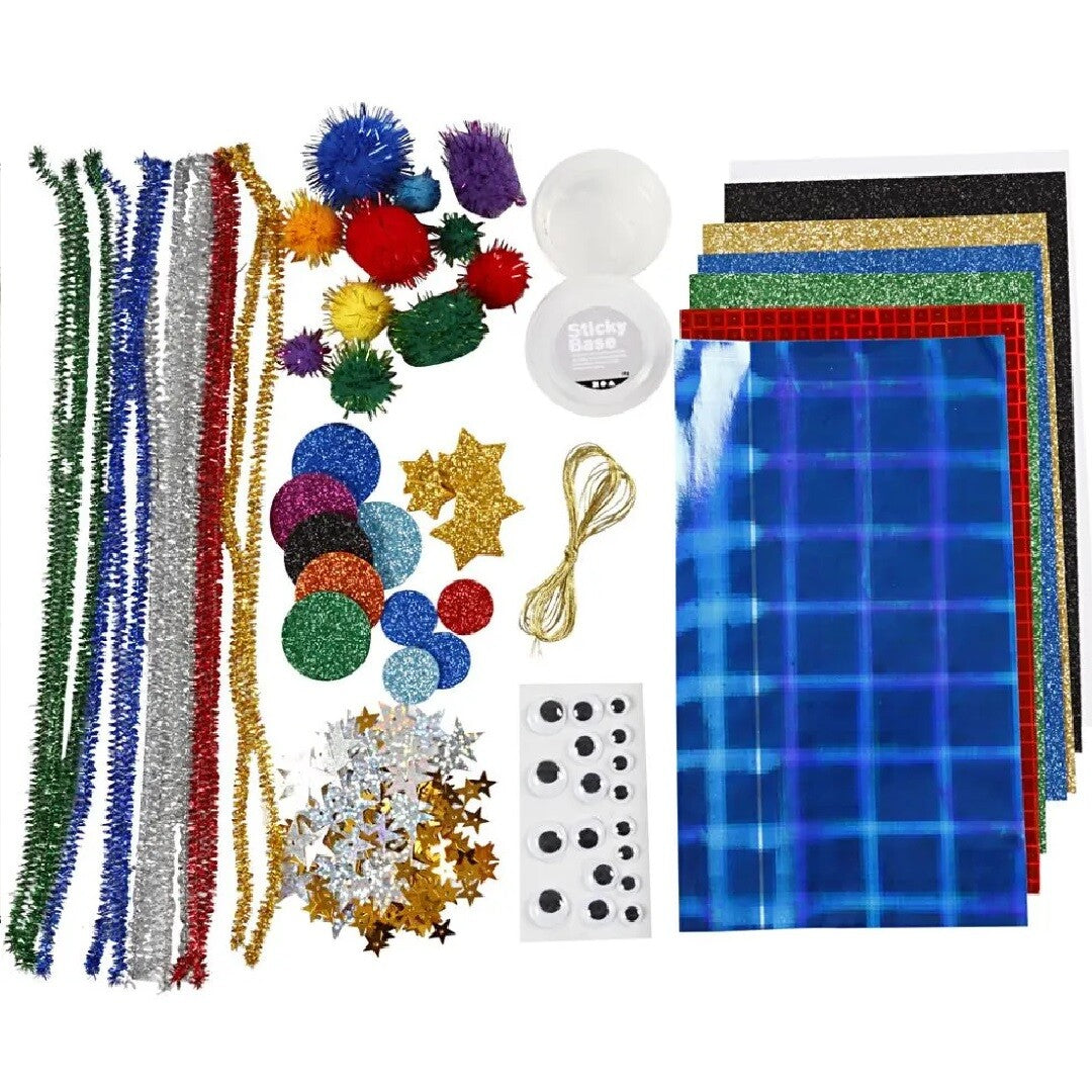 Creativ Company knutselset met diverse materialen zoals pijpenragers, pompons, glitterpapier en wiebelogen.