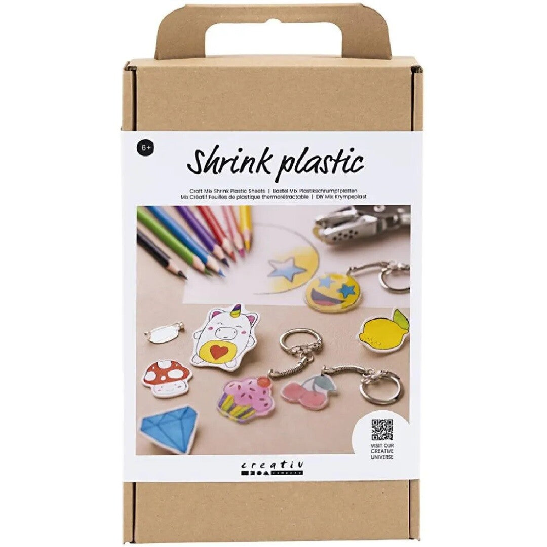 Verpakking van de creativ company knutselset krimpfolie met voorbeelden van gemaakte sleutelhangers.