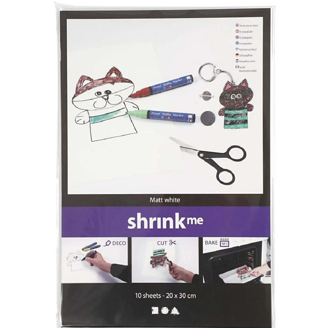 Verpakking van Creativ Company krimpfolie met voorbeelden van een getekende kat en een afgewerkte sleutelhanger.