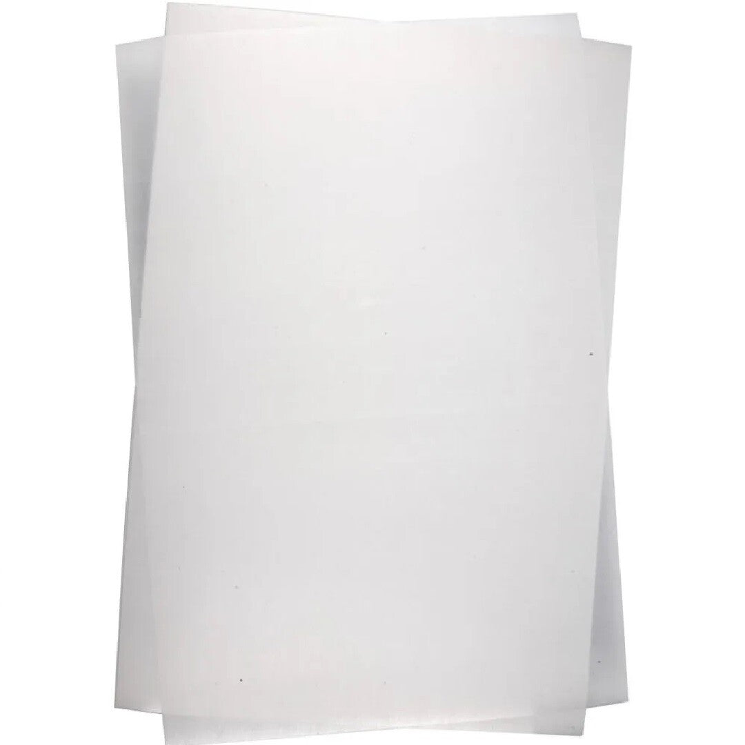 Stapel witte, matte Creativ Company krimpfolie vellen.