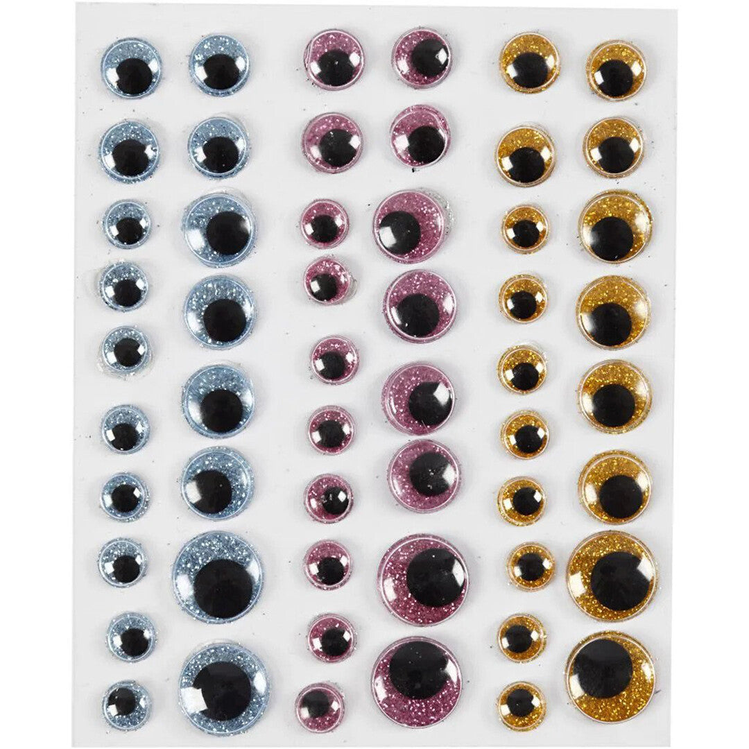 Creativ Company wiebelogen glitter mix, een vel met blauwe, roze en gouden wiebelogen in verschillende formaten.