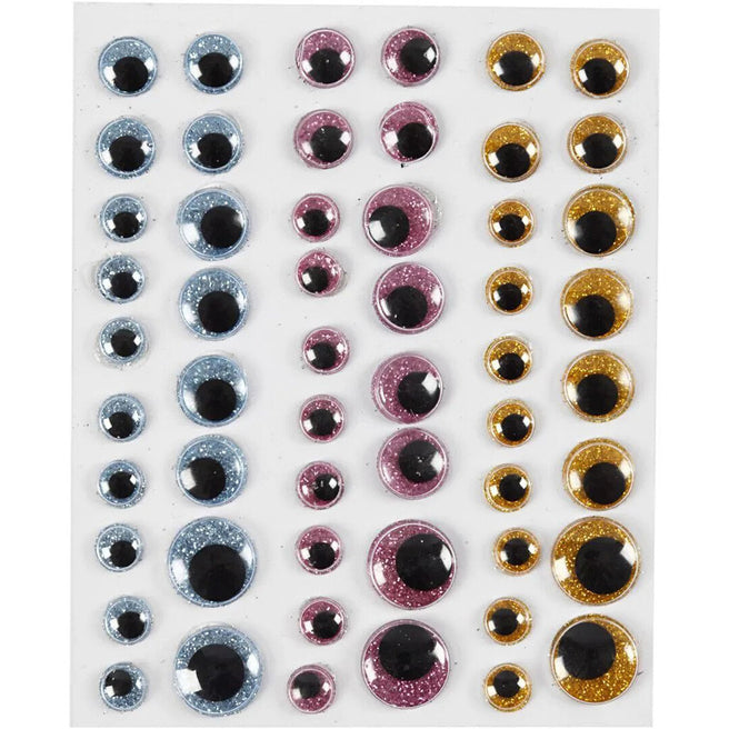Creativ Company wiebelogen glitter mix, een vel met blauwe, roze en gouden wiebelogen in verschillende formaten.