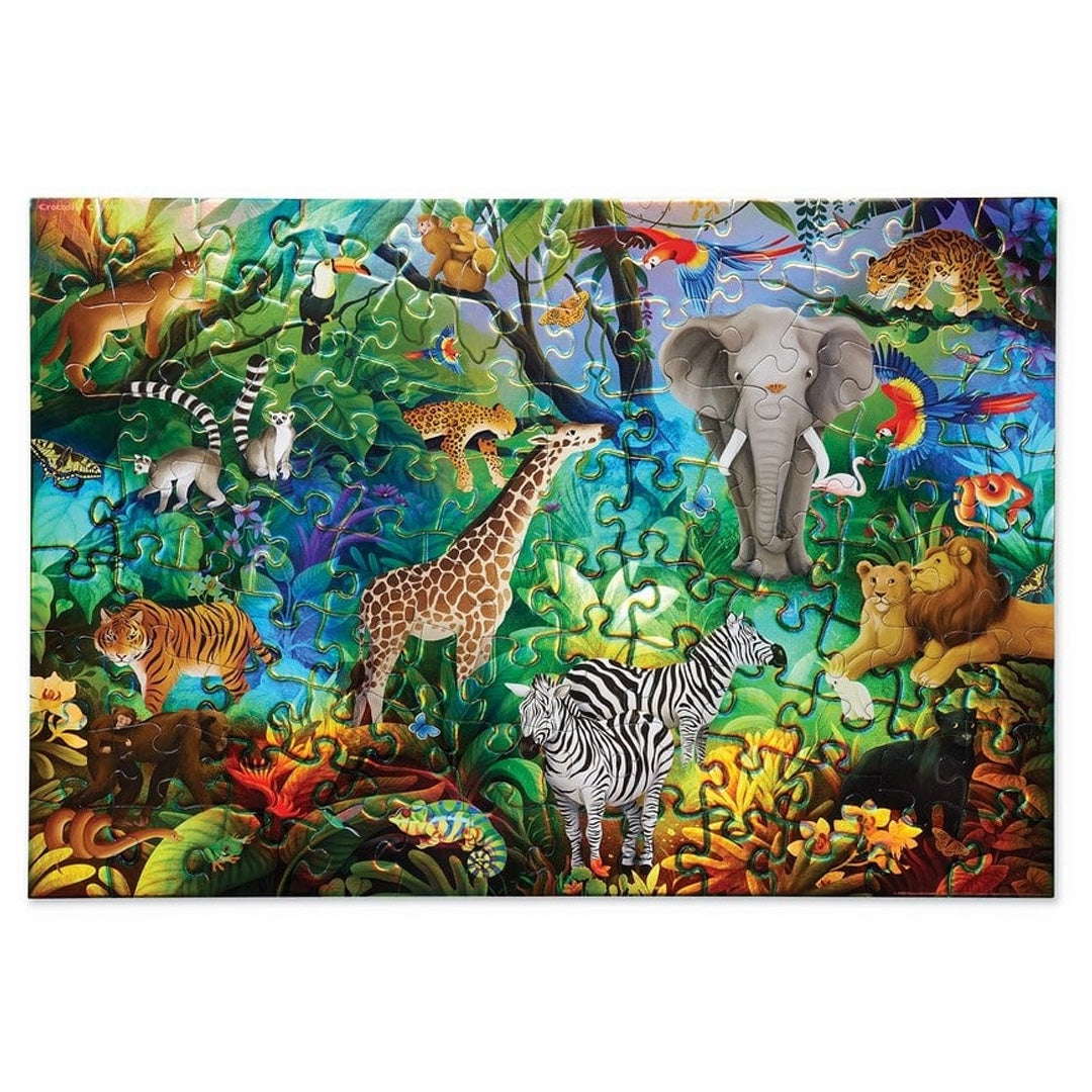 Voltooide holografische jungle puzzel met 100 stukjes, waarop diverse wilde dieren zoals een olifant, giraf en zebra's staan.