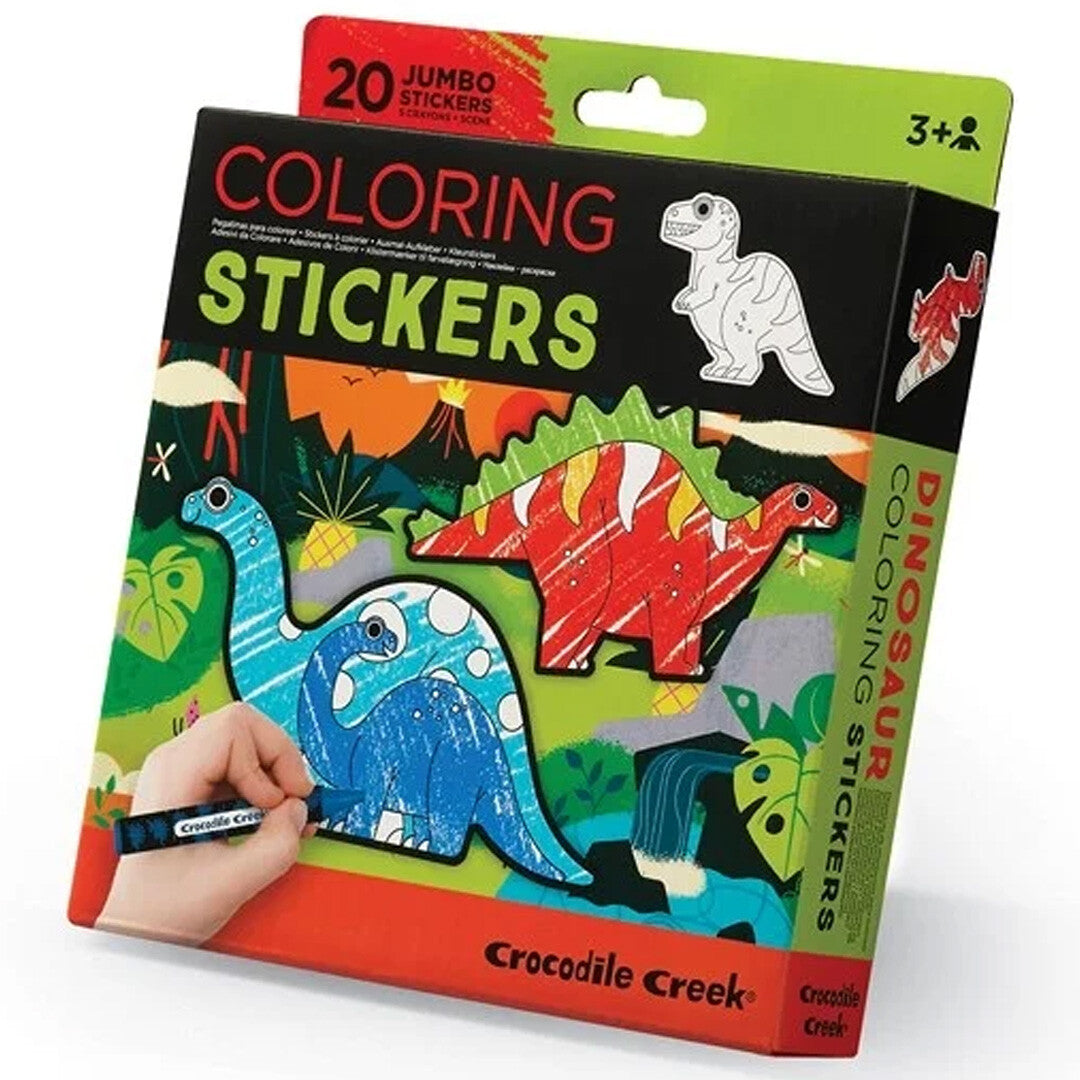 Verpakking van Crocodile Creek kleurstickers dinosaurus, met een hand die een dinosaurus inkleurt.