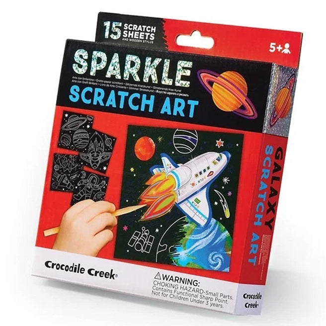 Crocodile Creek Sparkle Scratch Art hobbyset verpakking met ruimte thema.
