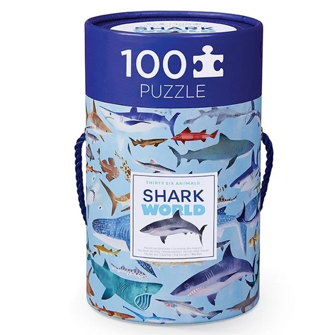 Crocodile Creek puzzelverpakking met haaien en de tekst '100 Puzzle Shark World'.