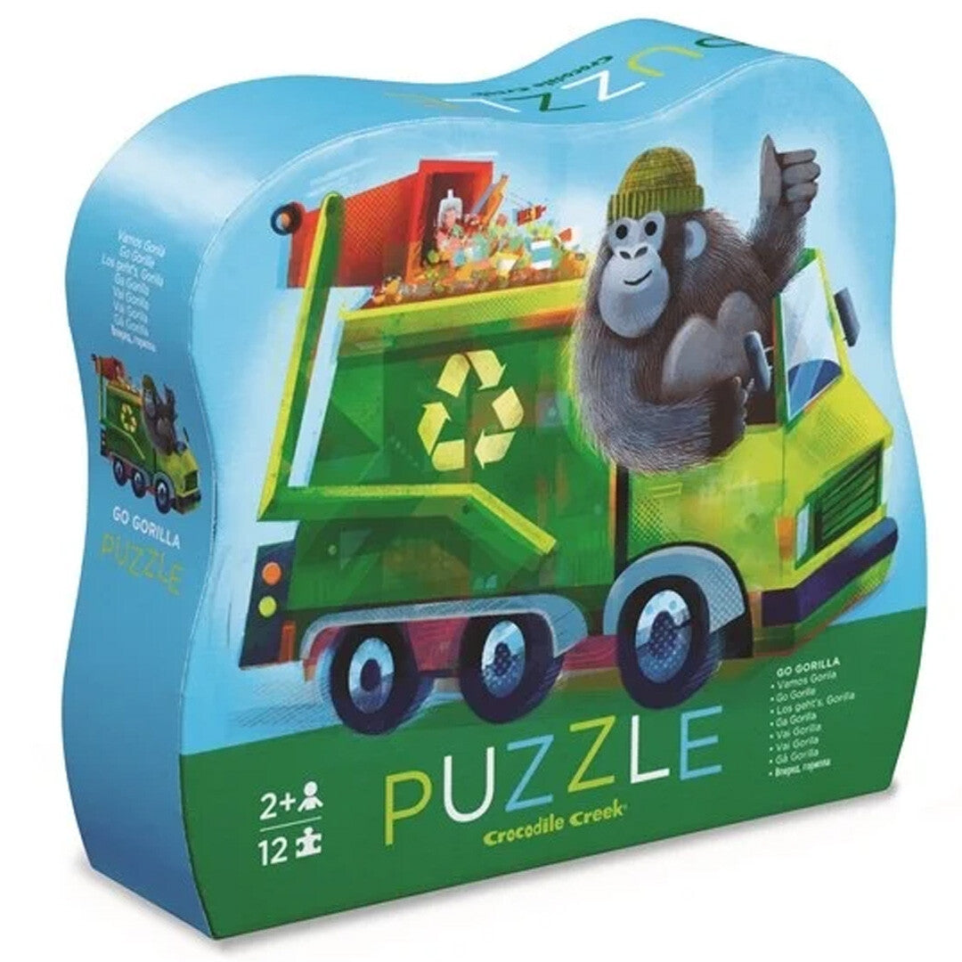 Crocodile Creek puzzelverpakking in de vorm van een puzzelstuk met een gorilla in een groene vuilniswagen.