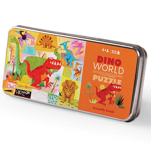 Crocodile Creek Dino World puzzel in blik met dinosaurusafbeeldingen.