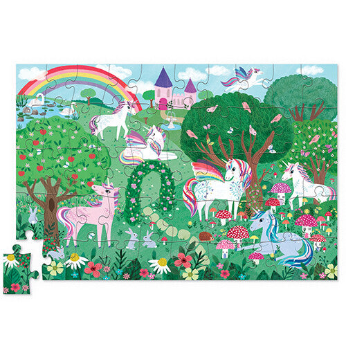 Voltooide puzzel met eenhoorns, een regenboog, een kasteel en een bloementuin.