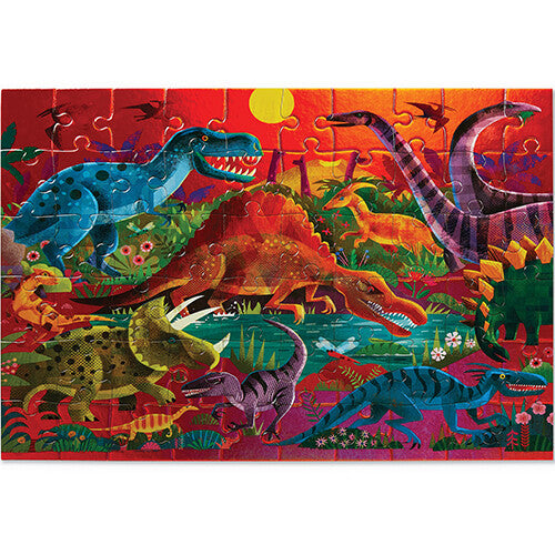 Voltooide Crocodile Creek legpuzzel met een kleurrijke illustratie van dinosaurussen in een prehistorisch landschap.