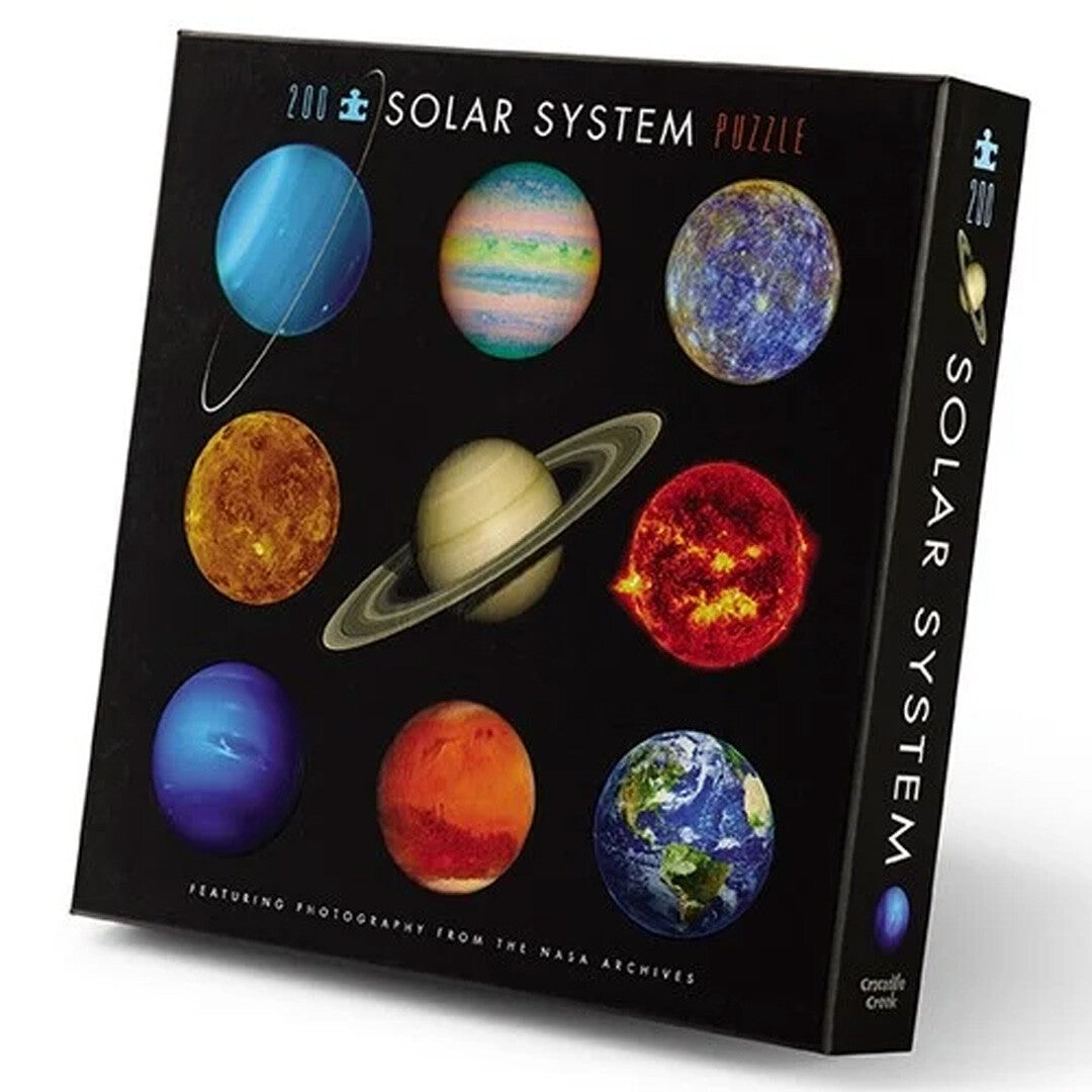 Verpakking van de Crocodile Creek zonnestelsel puzzel met negen planeten.