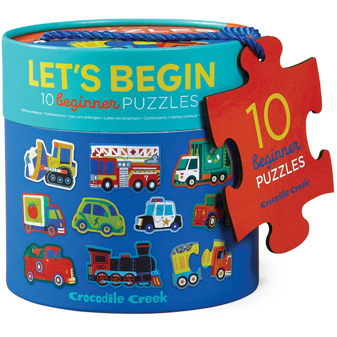 Crocodile Creek verpakking van 10 beginner voertuigpuzzels in een ronde blauwe doos met een rood puzzelstuklabel.