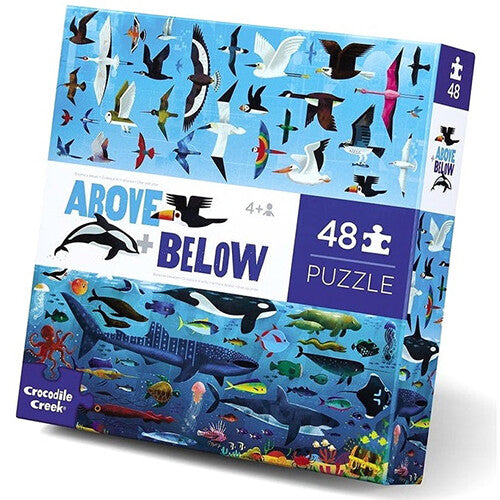 Verpakking van de Crocodile Creek vloerpuzzel 'Above + Below' met afbeeldingen van vogels en zeedieren.