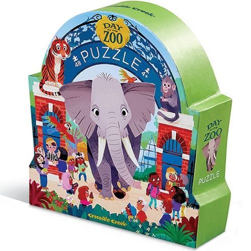 Crocodile Creek vloerpuzzel verpakking in de vorm van een boog met een illustratie van een olifant en mensen bij de ingang van een dierentuin.